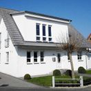 Umbaumaßnahme an einem Einfamilienhaus in Geseke Errichtung eines Dachaufbaus und eines Wintergarten